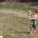 Playing in the sprinkler 1